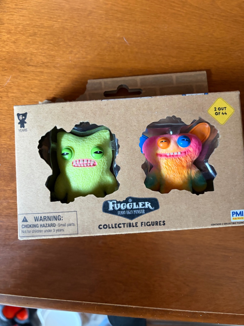 Fuggler Collectible Figures Set - Neon Green & Neon Pink/Orange